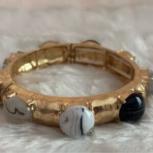 Elegant Gold and Black Bracelet